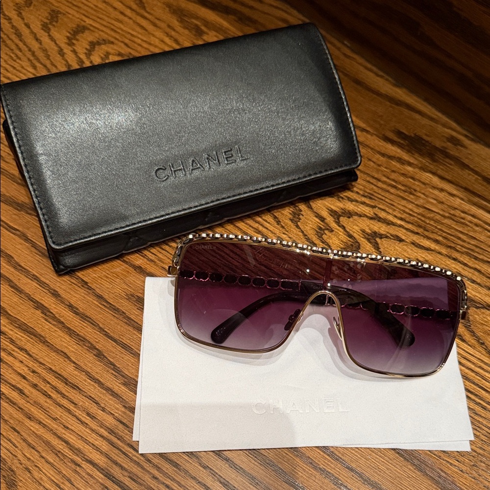 Chanel authentic sunglasses with leather design
